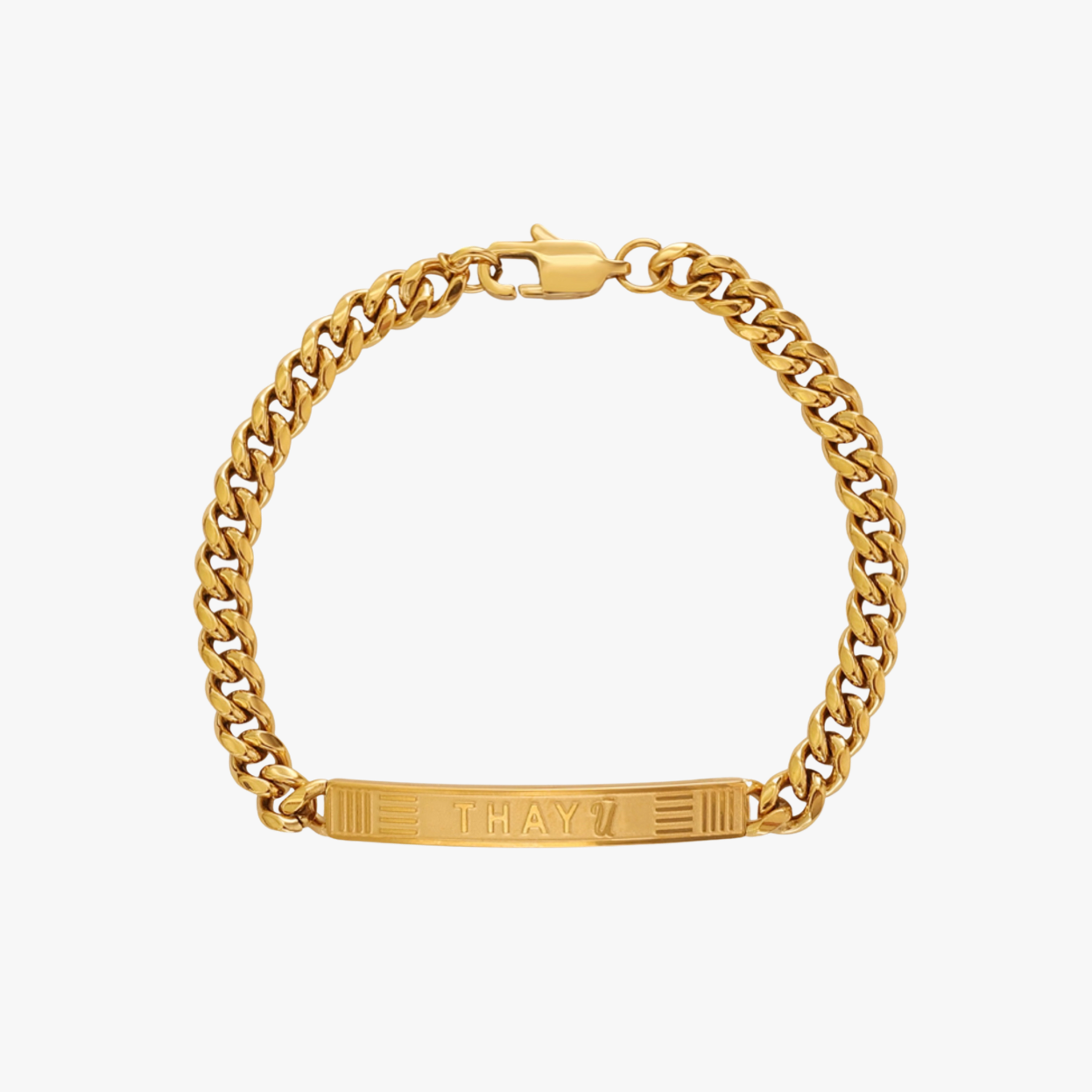 Gold chain bracelet with a tag on a white background